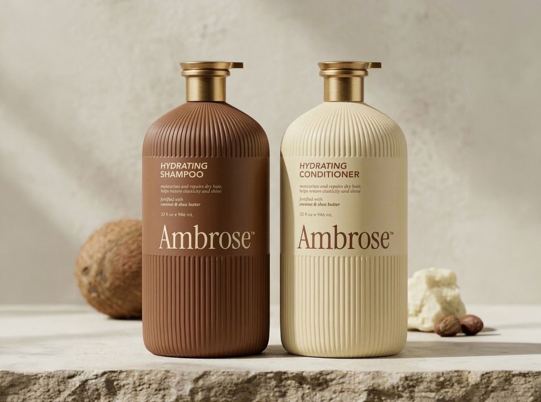 Ambrose hydrating shampoo and conditioner on a stone ledge